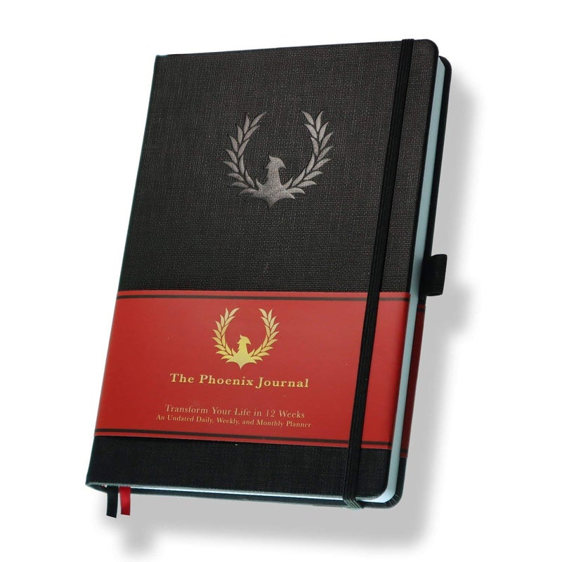 فينيكس بلانر The Phoenix Journal - أفضل منظم وتقويم لتخطيط الأهداف اليومية لتحديد الأهداف والامتنان والسعادة والإنتاجية - لوحة الرؤية وتتبع العادات - غلاف فني غير مؤرخ لمدة 12 أسبوعًا - أسود - Image 1